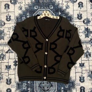 Hunter green horse-bit cardigan from Amazon